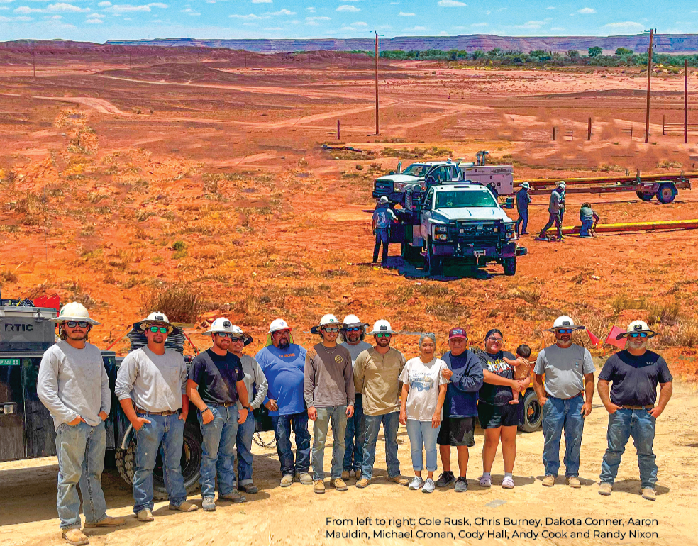 Linemen pictured together in Navajo nation.