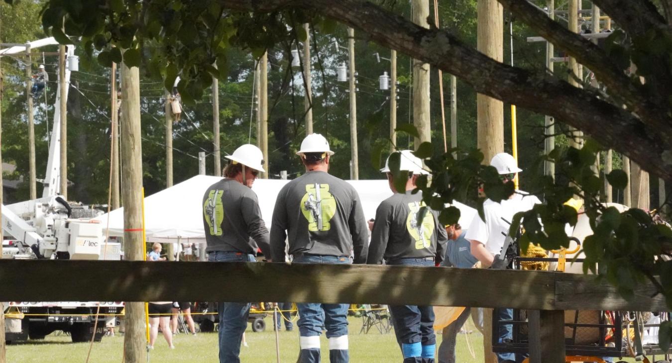 SSEMC linemen prepare their gear ahead of an event