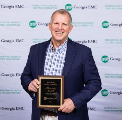 Scott Fuss was recently recognized for two heroic actions with the Lifesaving Award by Georgia EMC at the GEMC Annual Meeting